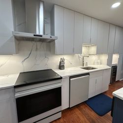 Small kitchen remodel contemporary style with white cabinetry and calacatta quartz