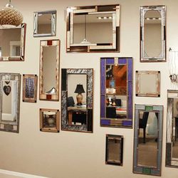 New Morning Gallery - Lovely cut glass mirrors come in many colors to match your décor.