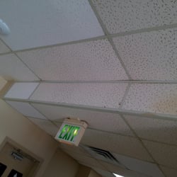 Ancient discolored ceiling tiles.