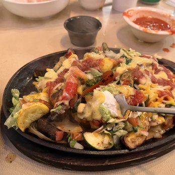 Las Palmas Mexican Restaurant - Combo fajitas after I mixed queso, guac, salsa, and lettuce. This plate was really good. Skipped the beans, rice and tortillas. - Mexican Near Me - Mansfield, Texas