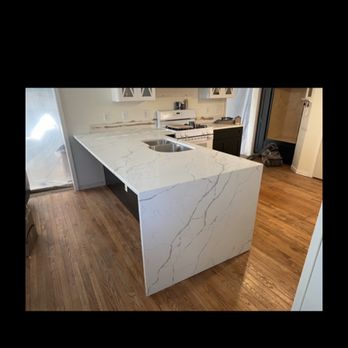 Black Laab - Kitchen counter tops with waterfall. - Countertop Installation Near Me Black Laab - Kitchen counter tops with waterfall. - Countertop Installation Near Me