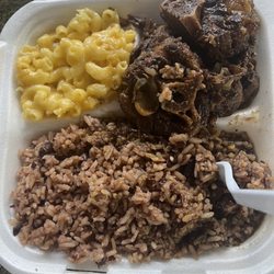 Riddim Kitchen Restaurant & Lounge - Oxtails, rice & peas, mac & cheese. Small portion. $20!