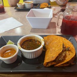 Birria Tacos featuring the purple "lemonade" Birria Tacos featuring the purple "lemonade"