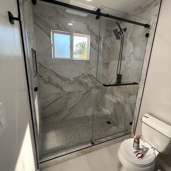 Innovation Glass & Windows - Sliding Shower with Matte Black Hardware - Windows Installation Near Me Innovation Glass & Windows - Sliding Shower with Matte Black Hardware - Windows Installation Near Me