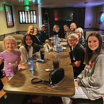 Pizza King - a group of people sitting at a table - Pizza Near Me - Auburn, Indiana