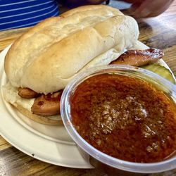 Abe's Restaurant - Zweigles  hotdog with a side of hot sauce