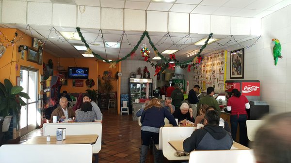 Photo of Taqueria Los Pericos - Campbell, CA, United States. Walking in..you can see tacky Christmas ornaments and water stains on the ceiling