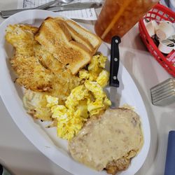 The Frying Pan - Tenderloin with gravy, toast, scrambled eggs, hash browns , unsweetened tea.