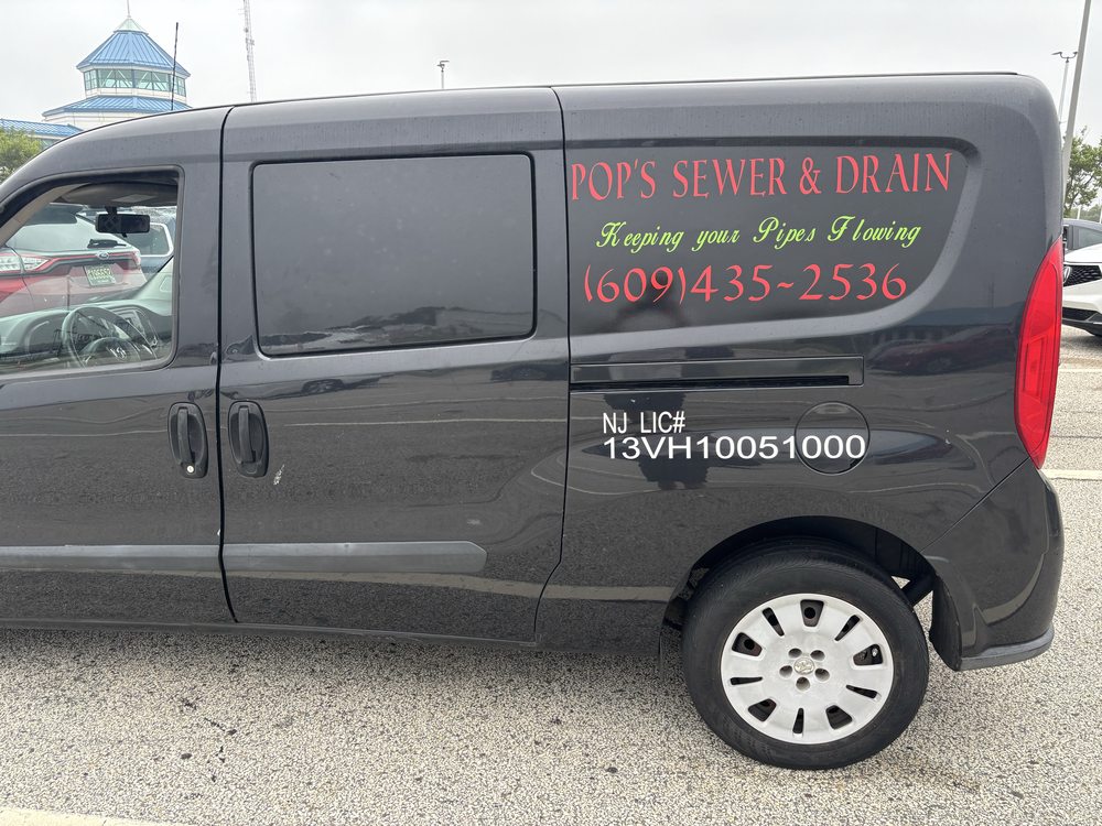 Slide of Pop’s Sewer & Drain