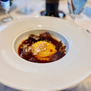 Seven Glaciers Restaurant - BRAISED SHORT RIB   Cheese & Spinach Ravioli | Green Peppercorn |Brown Butter | Shaved Parmesan - New American Near Me - Girdwood, Alaska