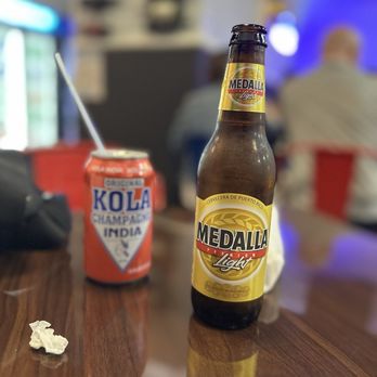La Empanada Loca - The real Kola Champagne & Medalla drinks can't get anymore Puerto Rican. - Puerto Rican Near Me - Oakland Park, Florida La Empanada Loca - The real Kola Champagne & Medalla drinks can't get anymore Puerto Rican. - Puerto Rican Near Me - Oakland Park, Florida