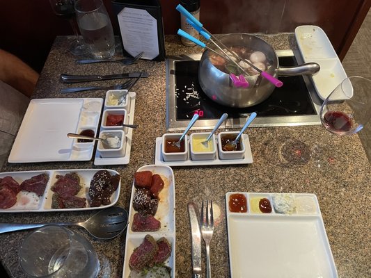 Photo of The Melting Pot - Grand Rapids, MI, US. Entrees - steak lovers and classic in coq a vin
