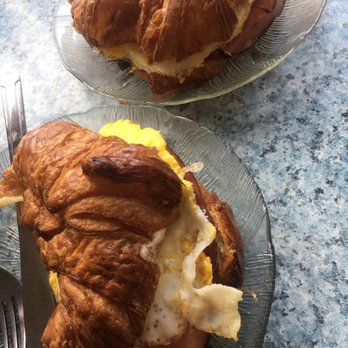 La Parisienne - Toasted ham & Swiss croissants with fried eggs in them. - Bakeries Near Me - Morro Bay, California La Parisienne - Toasted ham & Swiss croissants with fried eggs in them. - Bakeries Near Me - Morro Bay, California