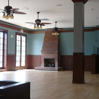 Western Flooring - an empty room with a fireplace - Flooring Near Me - Santee, California
