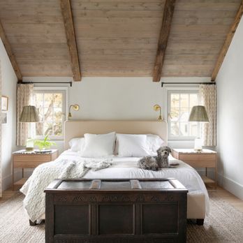 Kyle Hunt & Partners - The pitched ceilings in this primary bedroom make it feel spacious but still cozy. - General Contractors Near Me - Wayzata, Minnesota Kyle Hunt & Partners - The pitched ceilings in this primary bedroom make it feel spacious but still cozy. - General Contractors Near Me - Wayzata, Minnesota