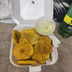 Papi's Kitchen - Tostones with Dipping sauce. The white sauce was amazing . Never a disappointment when I come. I love ordering from Papi!