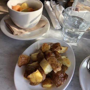 Lola’s - Side of potatoes and fruit - Wine Bars Near Me - Omaha, Nebraska Lola’s - Side of potatoes and fruit - Wine Bars Near Me - Omaha, Nebraska