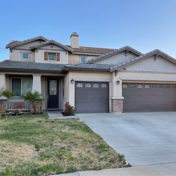 AM Pro Painting - Before new garage doors and paint. - Painters Near Me