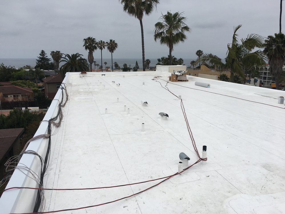 Slide of R Squared Roofing Services