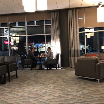Bentley's Lounge - two people sitting at a table - Lounges Near Me - London, Ontario