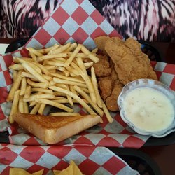 66 Chuck Wagon - Chicken strips- reasonable amount of coating- moist and tasty with just a little crunch. Fries were fries. The toast was very good.