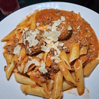 Renzo's Trattoria E Pizzeria - Bolognese with meatball - Italian Near Me - San Antonio, Texas Renzo's Trattoria E Pizzeria - Bolognese with meatball - Italian Near Me - San Antonio, Texas