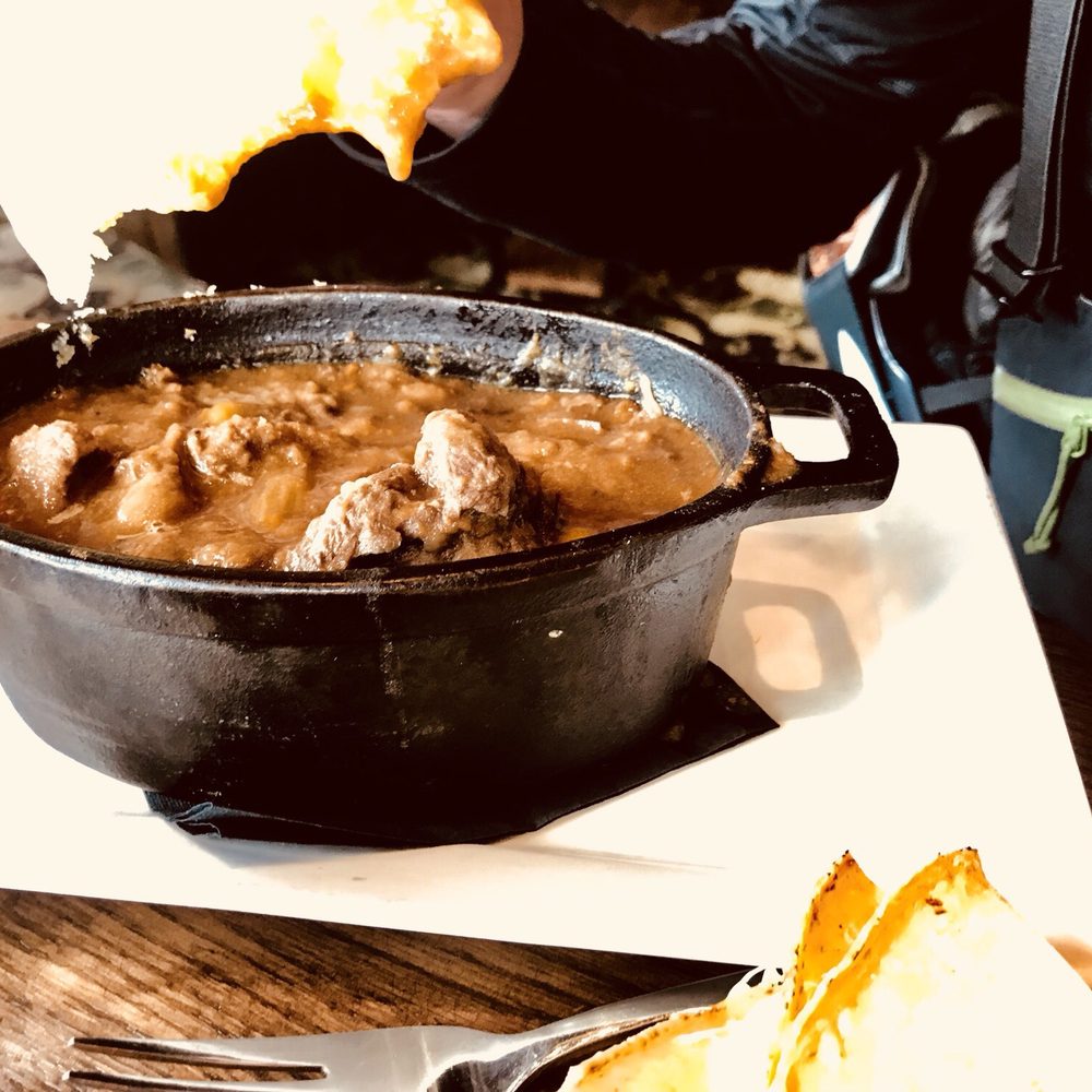 The Chimney Corner Fireside Dining - a pot of stew and bread - Diners Near Me - Edgewater, Alberta The Chimney Corner Fireside Dining - a pot of stew and bread - Diners Near Me - Edgewater, Alberta