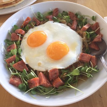 Over Easy - The girl got eggs over easy with rice, greens and Portuguese sausage - Breakfast & Brunch Near Me - Kailua, Hawaii Over Easy - The girl got eggs over easy with rice, greens and Portuguese sausage - Breakfast & Brunch Near Me - Kailua, Hawaii