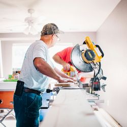 A1 Handyman - Precision carpentry in action--our team cutting and prepping materials for a custom interior project in Boise, ID.