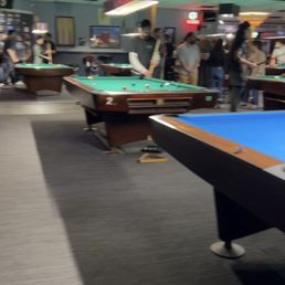 a pool table with a pool ball on it