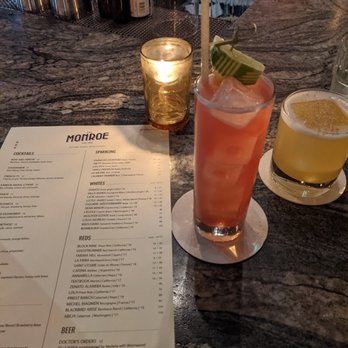 The Monroe - El Diablo (blanco tequila, cassis, citrus, gingerbeer) and Bow & Arrow (bourbon, mezcal, pineapple, cane, citrus). - New American Near Me - Orlando, Florida The Monroe - El Diablo (blanco tequila, cassis, citrus, gingerbeer) and Bow & Arrow (bourbon, mezcal, pineapple, cane, citrus). - New American Near Me - Orlando, Florida