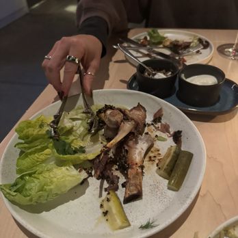 Ezov - Pastrami seasoned lamb shank. - Middle Eastern Near Me - Austin, Texas