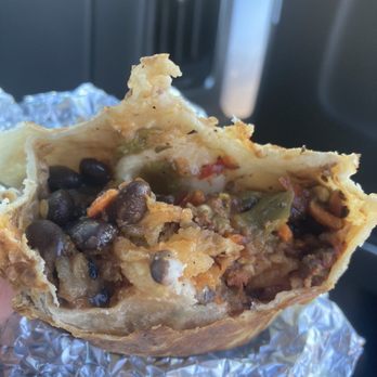 Sunrise Burritos - a hand holding a burrito - Breakfast & Brunch Near Me - Montrose, Colorado Sunrise Burritos - a hand holding a burrito - Breakfast & Brunch Near Me - Montrose, Colorado
