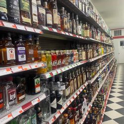 Ausable Market - A look at the "Wall of Liquor" we carry!  Come check us out - if we don't have it, we'll try to get it!