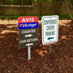 Avis Cool Springs-Embassy Suites - Avis sign indicating returns and directions to their counter.