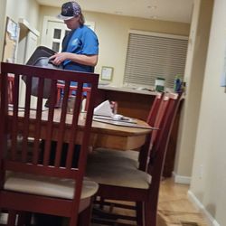Community Connections - A staff checking for a residents money