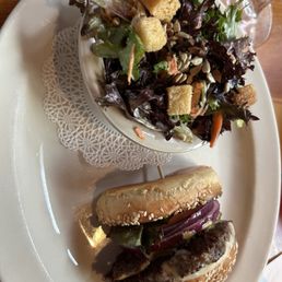Half burger and salad