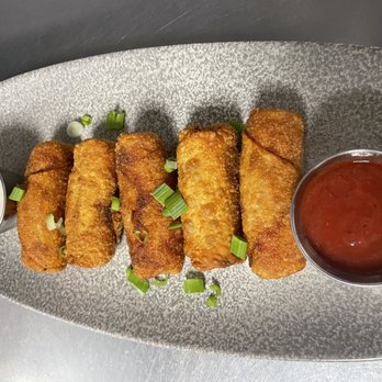 Tailgates - a platter of fried fish sticks with dipping sauce - Sports Bars Near Me - Welland, Ontario Tailgates - a platter of fried fish sticks with dipping sauce - Sports Bars Near Me - Welland, Ontario