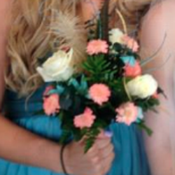 Bridgeview Flowers & Gifts - Loved the bouquets! (Feathers, succulents, and extra unusual organic attachments in my arrangement) Great job.