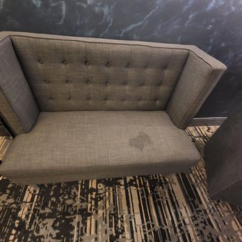 Sheraton Fallsview Hotel - Stain smelling like vomit left by homeless man on couch by elevators on 19th floor - Hotels Near Me - Niagara Falls, Ontario