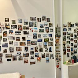 Marcel Market - A wall of photos.