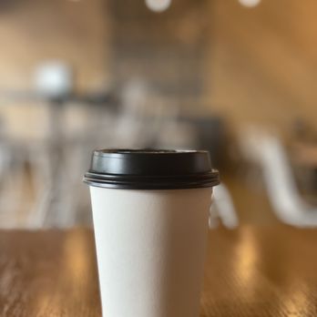 Eggholic - a coffee cup on a table - Indian Near Me - Irving, Texas