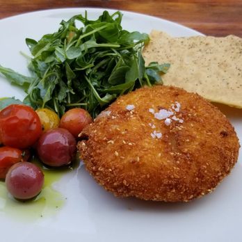 Curio - FRIED BURRATA CHEESE: smoked tomato, wild arugula, preserved lemon, sesame seeds ($15) - Bars Near Me - San Francisco, California