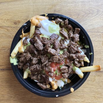 Brick and Flour - Carne Asada fries (half portions): nacho cheese, house salsa, guacamole, chipotle aioli, cilantro avocado aioli, and sour cream. BOMB! - Mexican Near Me - Glendale, California Brick and Flour - Carne Asada fries (half portions): nacho cheese, house salsa, guacamole, chipotle aioli, cilantro avocado aioli, and sour cream. BOMB! - Mexican Near Me - Glendale, California