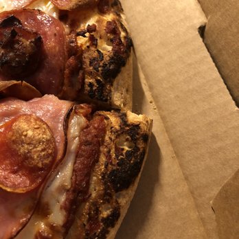 Mountain Mike's Pizza - Burned edges unfortunately on our large Pike's Peak - Pizza Near Me - Castro Valley, California