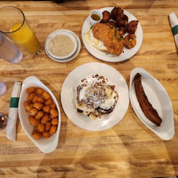 Phoebe's Diner - Chicken and waffles w/gravy, bananas foster French toast, slab bacon, tater tot, and blood orange juice - Diners Near Me - Austin, Texas