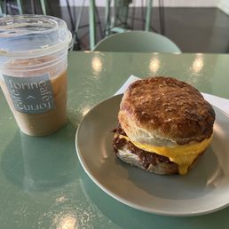 Killer breakfast sandwich! Bacon, egg, and cheese on a huge, fluffy biscuit! So good!