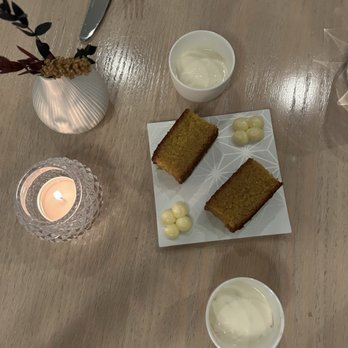 Bresca - Corn bread with honey butter dollops and a yogurt parfait. - New American Near Me - Washington, DC, District of Columbia