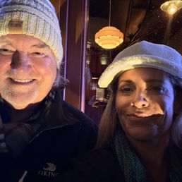Happy and satisfied smiles after dinner.
