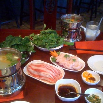 Mala Tang - Hot pot spread with mild broth, sirloin, flounder, spinach, green bean leaves, enoki mushrooms and Sichuan sauce - Chinese Near Me - Arlington, Virginia Mala Tang - Hot pot spread with mild broth, sirloin, flounder, spinach, green bean leaves, enoki mushrooms and Sichuan sauce - Chinese Near Me - Arlington, Virginia